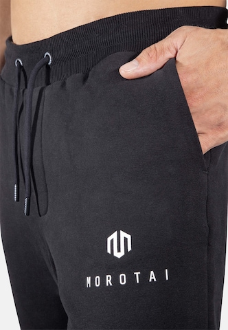 MOROTAI Zwężany krój Spodnie sportowe 'Corporate' w kolorze czarny