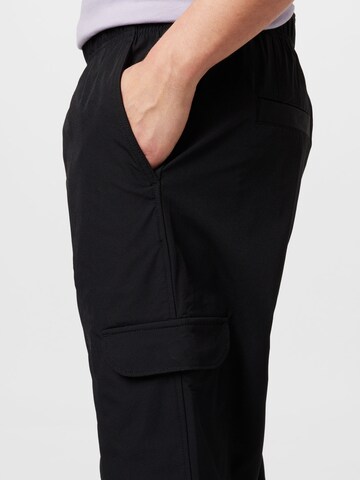 Effilé Pantalon cargo Calvin Klein Jeans en noir