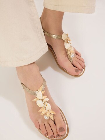 Tongs Trendyol en or