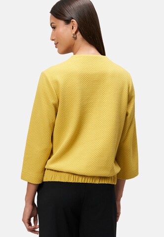 Felpa di zero in giallo
