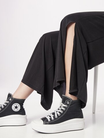 ABOUT YOU - Pierna ancha Pantalón 'Caro' en gris