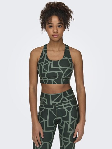 ONLY PLAY Medium Support Sports bra 'ONPDAISY-2' in Green: front