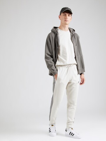ADIDAS SPORTSWEAR - Tapered Calças de desporto em bege