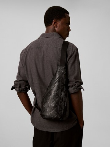 Sac à bandoulière Calvin Klein en noir : devant