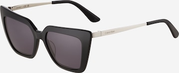 Lunettes de soleil Calvin Klein en noir : devant