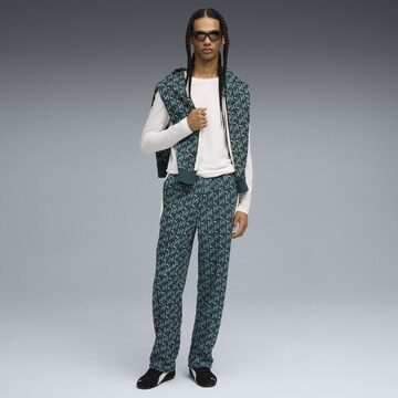 PUMA Loosefit Sportbroek 'T7' in Groen