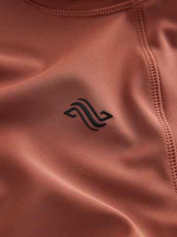 Next - Protección UV en marrón