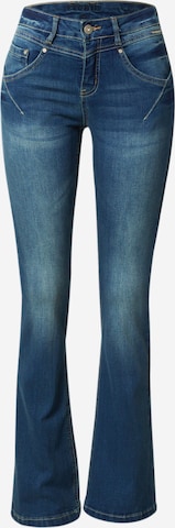 Cream Bootcut Jeans i blå: framsida