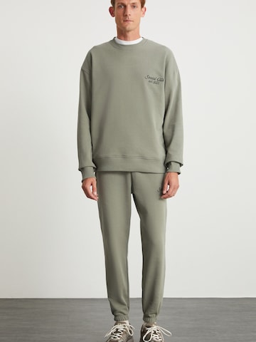 Grimelange Облекло за бягане в зелено