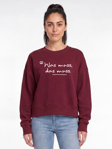 Sweat-shirt 'Was Muss Das Muss' Watapparel en rouge : devant
