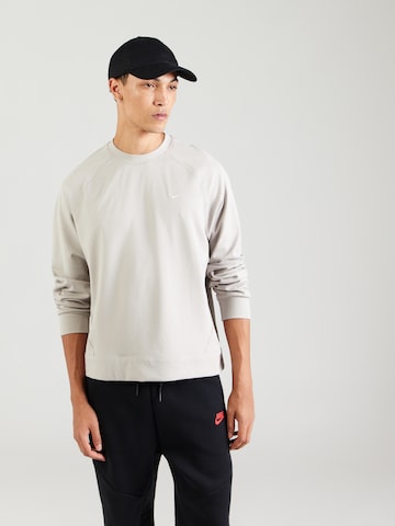 NIKESportska sweater majica 'Primary' - siva boja: prednji dio