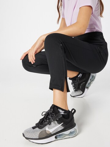 NIKE Regular Sports trousers in Black