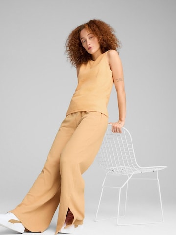 Top 'Puma Her Tank Top' di PUMA in arancione