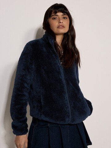 Apricot Between-Season Jacket in Blue: front