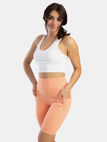 Skinny Pantaloni sportivi di Spyder in arancione