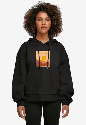 Merchcode Sweatshirt 'Peanuts - Nevada' in Schwarz: predná strana