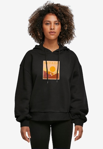 Merchcode Sweatshirt 'Peanuts - Nevada' in Zwart: voorkant