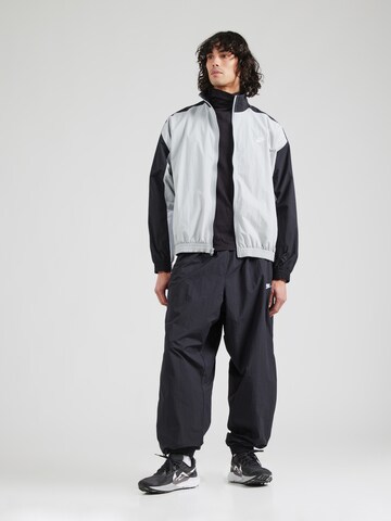 Giacca di mezza stagione 'CLUB' di Nike Sportswear in grigio
