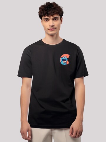 F4NT4STIC T-Shirt 'Sesamstraße Cookie Monster "C"' in Schwarz: Vorderseite