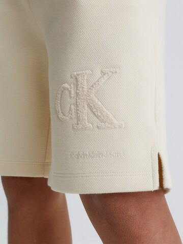 Calvin Klein Jeans Regular Pants 'Interlock' in Beige