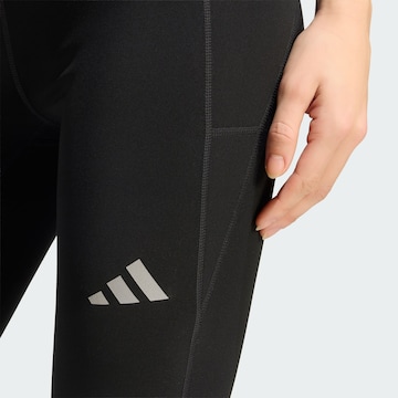 Skinny Pantaloni sportivi 'Essentials Winterized' di ADIDAS PERFORMANCE in nero