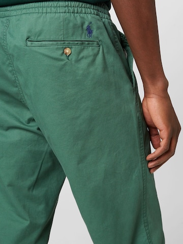 Polo Ralph Lauren Bootcut Hlače 'PREPSTER' | zelena barva