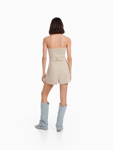 Tuta jumpsuit di Bershka in beige