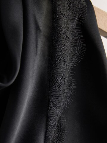 Next - Chal en negro