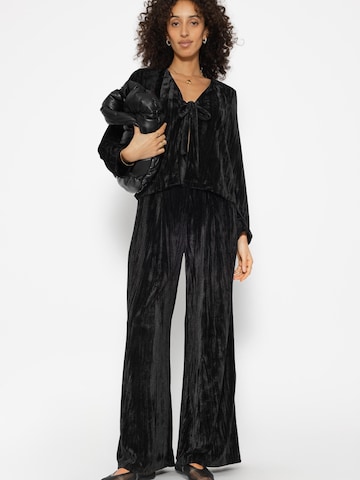 SASSYCLASSY Loosefit Hose in Schwarz