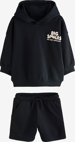 Next Setti värissä musta: etupuoli