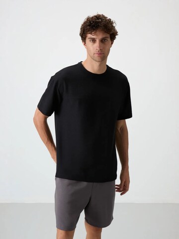 Tommy Life T-Shirts in Schwarz