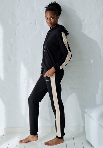 Tapered Pantaloni di s.Oliver in nero