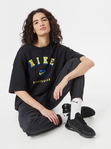 Tricou supradimensional de la Nike Sportswear pe negru