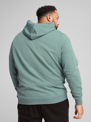 PUMA Bluzka sportowa 'Ess Small No. 1' w kolorze zielony