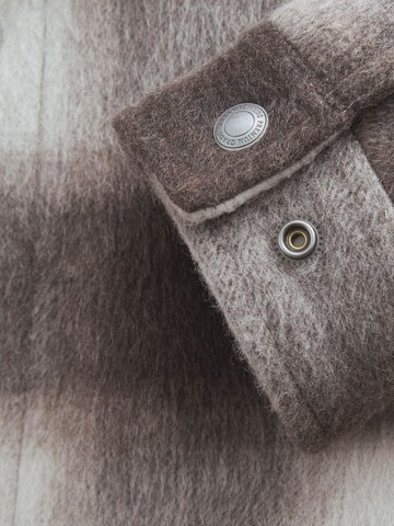 Next Tussenjas in Beige