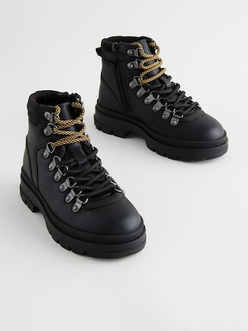 Bottes Next en noir