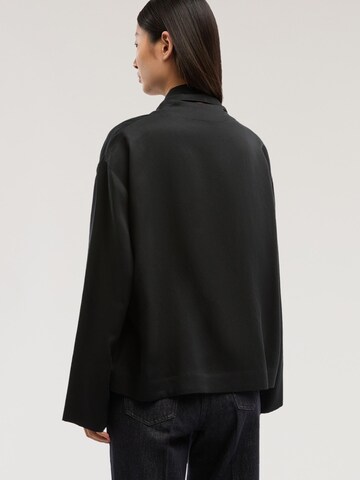 Trussardi - Blusa en negro