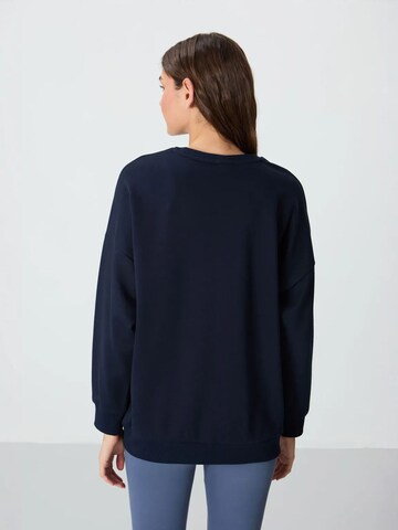 Sweat-shirt Tommy Life en bleu
