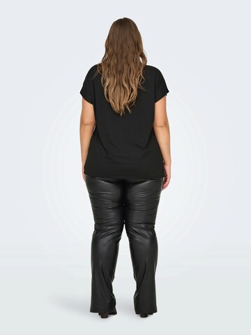 ONLY Carmakoma - Camiseta 'CARMOSTER' en negro