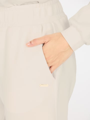 Tapered Pantaloni sport 'Jillnana V2' de la Athlecia pe gri