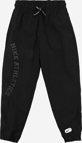 Loosefit Pantalon de sport NIKE en noir : devant