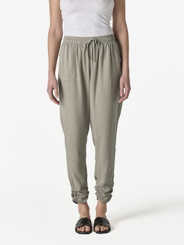 KOROSHI Tapered Housut värissä vihreä: etupuoli