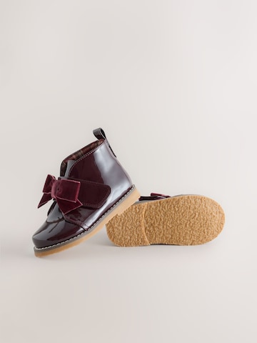 Next - Botas en rojo