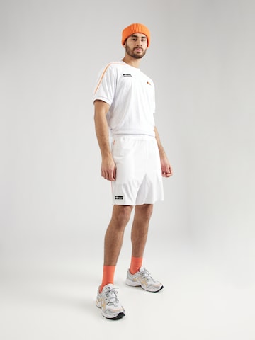 ELLESSE Normalny krój Spodnie sportowe 'Tintagel' w kolorze biały