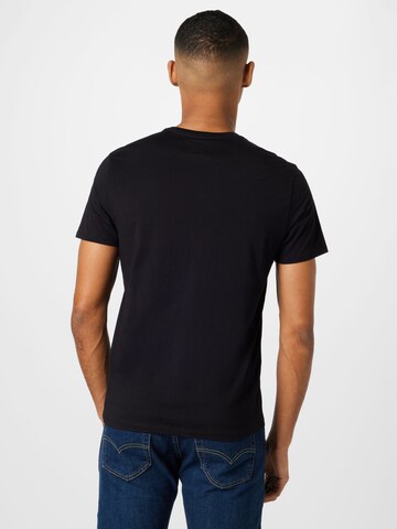 GUESS T-Shirt in Schwarz