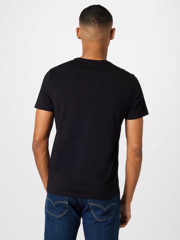 GUESS T-Shirt in Schwarz