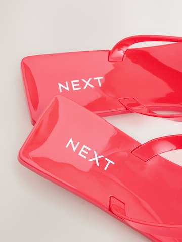 Tongs Next en rouge