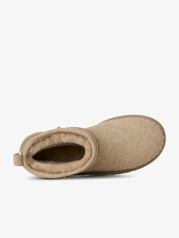 UGG - Botas 'Classic Ultra Mini' em bege