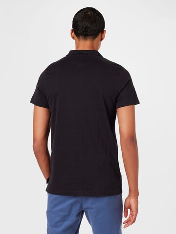 Tommy Jeans Poloshirt in Schwarz