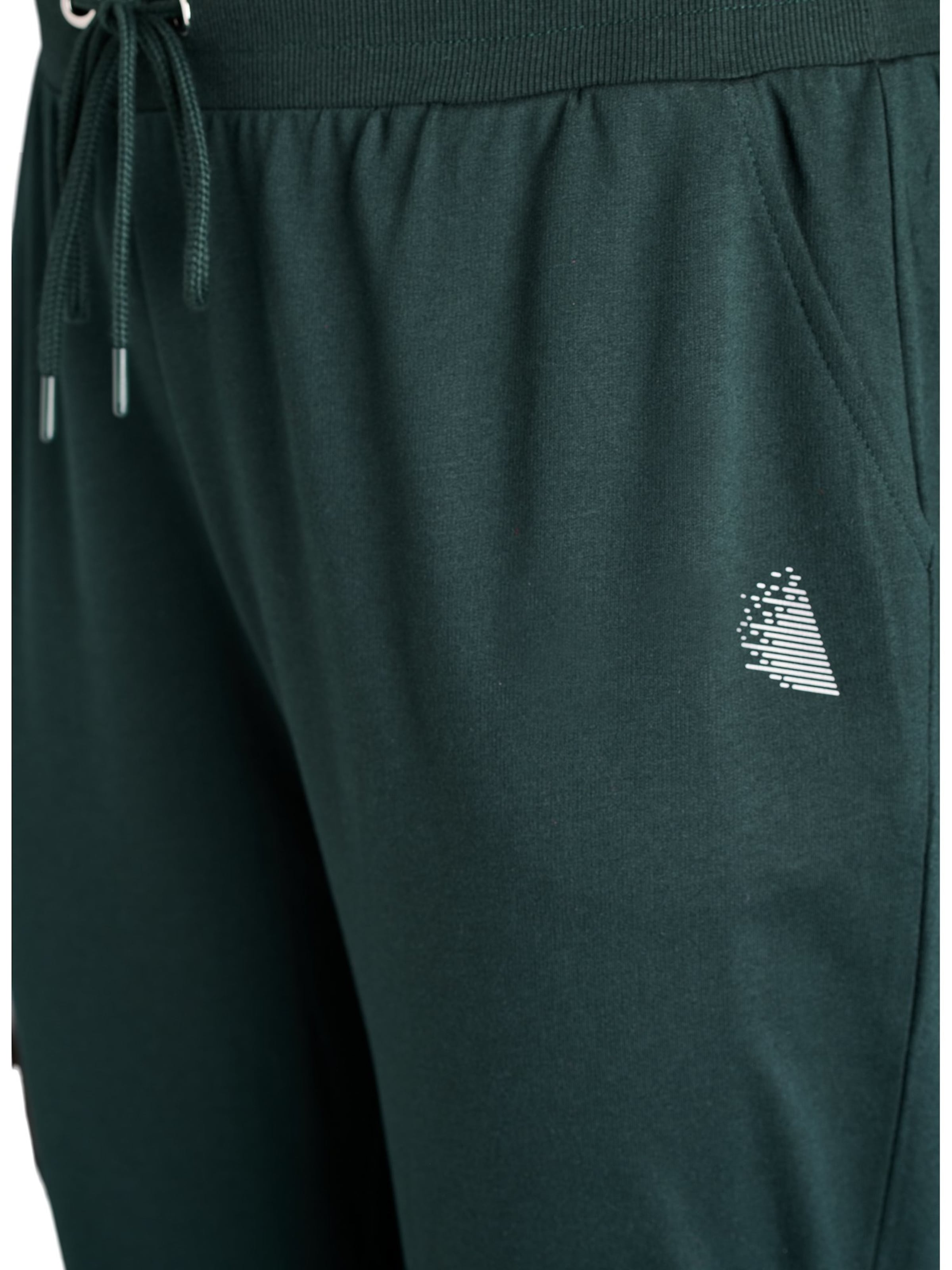 Active by Zizzi Дънки Tapered Leg Панталон 'Abasic' в зелено